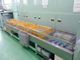 自動搬送装置付き4槽式自動洗浄機